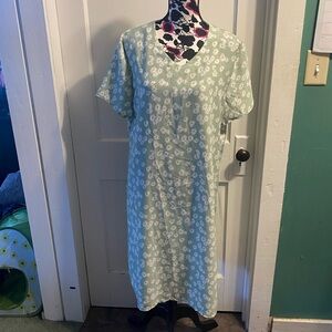 Calf-length green dress with white flowers